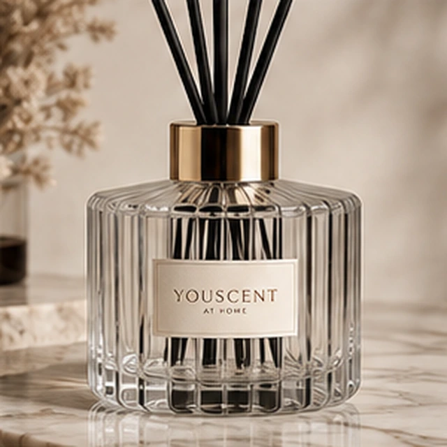 The Crystal reed diffuser, clear fluted glass. a polished accent. Label saying Made yours.